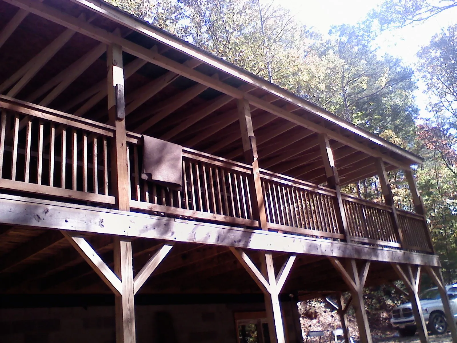Timber framing under a new elevated porch and deck — Roof Leak Repair in Salix by Roofing Brothers